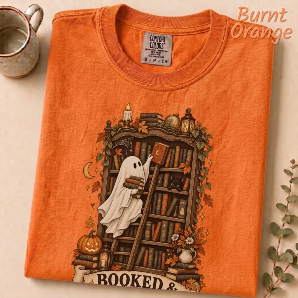 Booked & Boo-sy Ghost, Cozy Halloween Library Book Lover — alternate product mockup Booked & Boo-sy Halloween ghost shirt t-shirt lifestyle scene