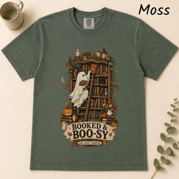 Booked & Boo-sy Ghost, Cozy Halloween Library Book Lover — alternate product mockup Booked & Boo-sy Halloween ghost shirt t-shirt flat lay view
