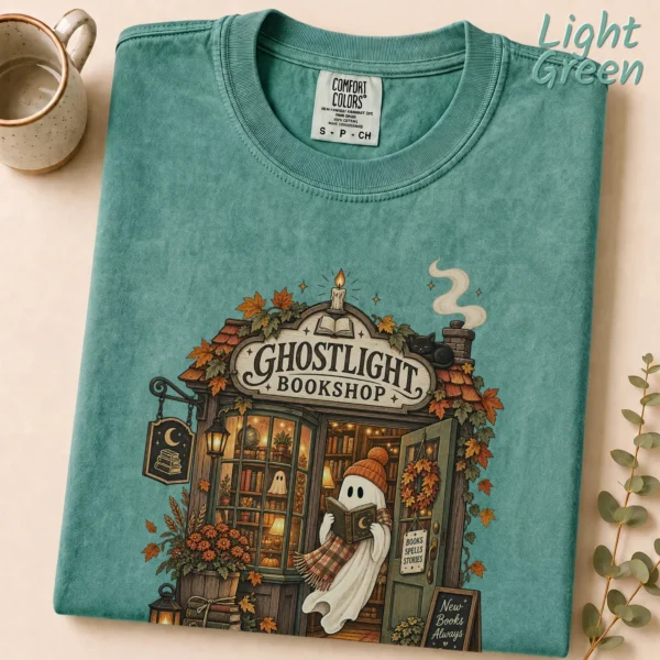 Ghostlight Bookshop Ghost, Spooky Autumn Book Lover — alternate product mockup Ghostlight Bookshop Halloween Shirt t-shirt styled product photo