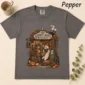 Ghostlight Bookshop Halloween Shirt t-shirt flat lay view