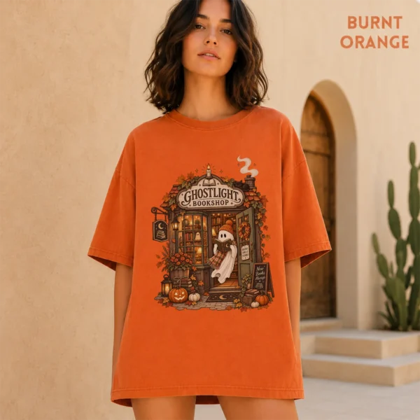 Ghostlight Bookshop Ghost, Spooky Autumn Book Lover — alternate product mockup Ghostlight Bookshop Halloween Shirt t-shirt color options