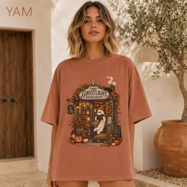 Ghostlight Bookshop Ghost, Spooky Autumn Book Lover — alternate product mockup Ghostlight Bookshop Halloween Shirt t-shirt color options