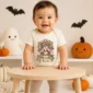 personalized cerberus baby bodysuit close-up detail