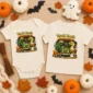 halloween truck baby bodysuit flat lay view