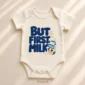but first milk baby bodysuit close-up detail