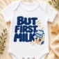 but first milk baby bodysuit close-up detail