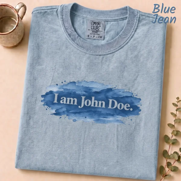 Lettering Multi Style Apparel I Am John Doe. Shirt — alternate product mockup i am john doe lettering multi-style apparel t-shirt product photo