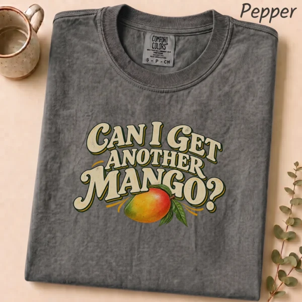 Illustrated Ripe Multi Style Apparel Can I Get Another Mango? Shirt — alternate product mockup illustrated ripe mango multi-style apparel t-shirt lifestyle scene