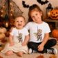 knight cat baby bodysuit & toddler shirt close-up detail