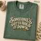 someone's gotta hold it down. shirt t-shirt close-up detail