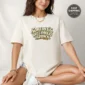 someone's gotta hold it down. shirt t-shirt product photo